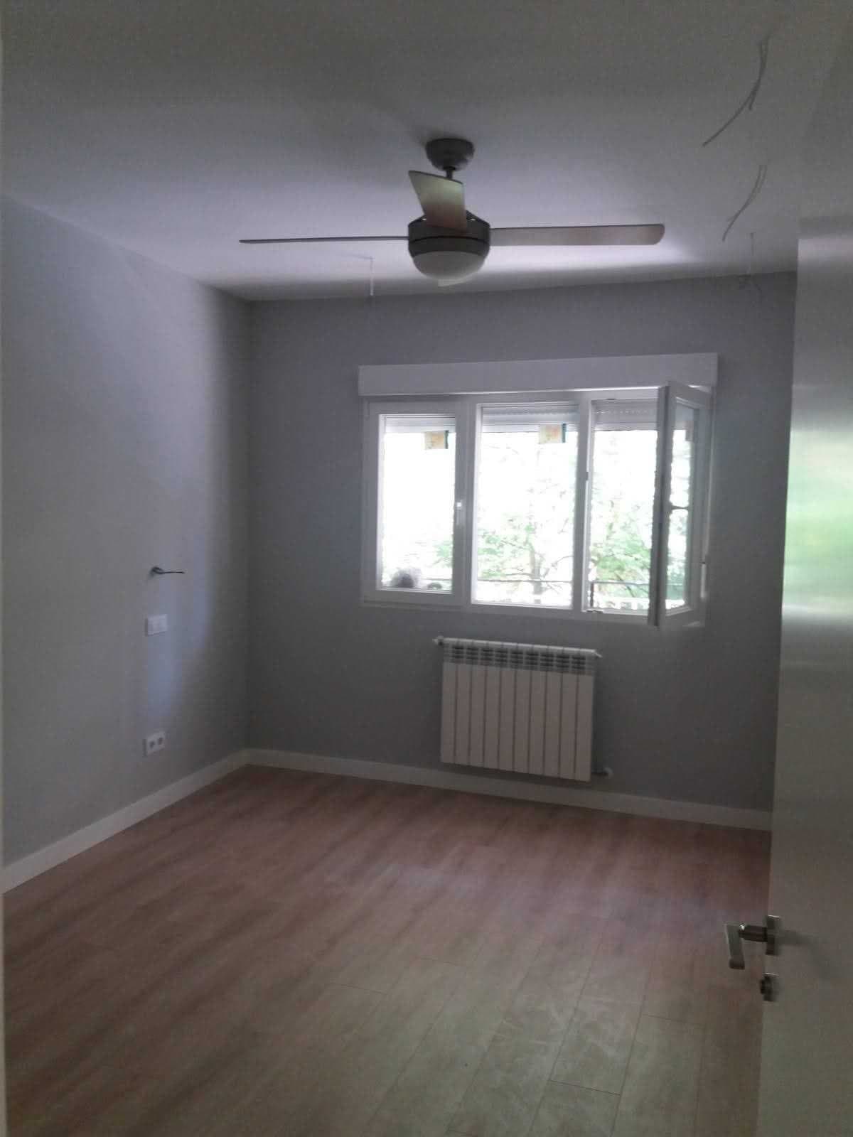 Después de la reforma: un dormitorio de una reforma integral en Madrid, antes y después