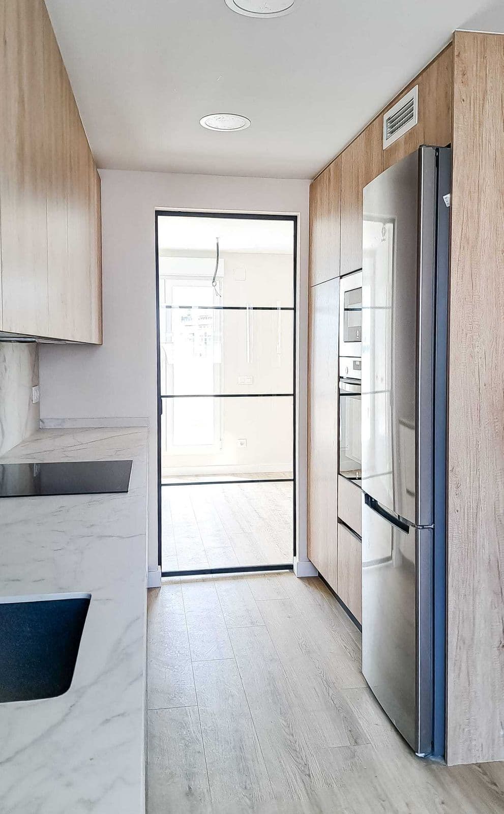 Reforma integral en Delicias, Madrid — 80 m² (2024) · foto 2